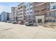 Exterior view of a residential building with parking at 2200 S University Blvd # 511, Denver, CO 80210