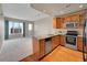 Modern kitchen with granite countertops and stainless steel appliances at 2200 S University Blvd # 511, Denver, CO 80210