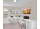 Home office with built-in shelves and two desks at 2200 S University Blvd # 511, Denver, CO 80210