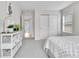 Comfortable bedroom with soft carpet, closet, large window, and decorative decor at 3178 N Race St, Denver, CO 80205