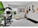 Inviting bedroom with a large window, home office setup, decor, and a comfortable beanbag chair at 3178 N Race St, Denver, CO 80205