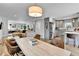Open floor plan showcasing dining area with adjacent kitchen and living spaces at 3178 N Race St, Denver, CO 80205
