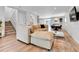 Open-concept living space with comfortable seating, and seamless flow to dining area at 3178 N Race St, Denver, CO 80205