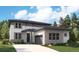 Two-story home with gray and white siding, attached garage, and landscaping at 1141 Joseph Pl, Erie, CO 80026