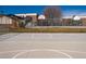 Outdoor basketball court with hoops on either end, ready for friendly games at 5995 W Hampden Ave # 17C, Denver, CO 80227