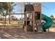 Wooden playground with swings, climbing wall, and slide for outdoor fun at 5995 W Hampden Ave # 17C, Denver, CO 80227