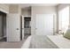 Serene bedroom with ensuite bathroom and light color scheme at 10270 E 62Nd Pl, Denver, CO 80238