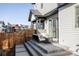 Private patio with seating and side yard access at 10270 E 62Nd Pl, Denver, CO 80238