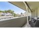 Comfortable balcony area with outdoor seating, offering a relaxing space with a view of the surrounding neighborhood at 10685 W Apishapa Pass, Littleton, CO 80127