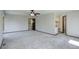 Large carpeted bedroom with big windows and walk-in closet at 7877 W 110Th Dr, Westminster, CO 80021