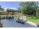 Outdoor deck featuring lounge chairs, a dining table, and a pergola for shade at 7877 W 110Th Dr, Westminster, CO 80021