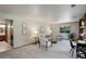 Spacious living room is bright and airy with a large picture window and neutral decor at 7877 W 110Th Dr, Westminster, CO 80021