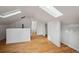 Bright bedroom with skylights featuring wood floors at 253 N Lincoln St, Denver, CO 80203
