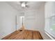 Bedroom featuring white paint, natural light, and built in shelving at 253 N Lincoln St, Denver, CO 80203