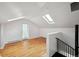 Bright bedroom with high ceilings and hardwood floors and a glass door at 253 N Lincoln St, Denver, CO 80203