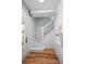 Light and bright entryway features a staircase and a modern mail box at 253 N Lincoln St, Denver, CO 80203