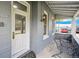 Inviting front porch with seating, perfect for relaxing and enjoying the neighborhood ambiance at 253 N Lincoln St, Denver, CO 80203