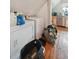 Laundry area features side by side washer and dryer, and storage at 253 N Lincoln St, Denver, CO 80203