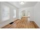 Beautiful living room with wood floors and an archway to other rooms in the home at 253 N Lincoln St, Denver, CO 80203