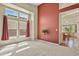 Bright dining room with large windows, a chandelier, and an open layout into the kitchen at 20928 E Hamilton Ave, Aurora, CO 80013