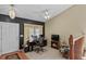 Comfortable loft featuring a workspace, calming decor, and a charming view of the outdoors at 20928 E Hamilton Ave, Aurora, CO 80013