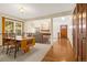 Inviting dining area with wood table, chairs, and sliding glass doors to the outside at 7655 S Olive Cir, Centennial, CO 80112