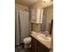 Bathroom featuring a toilet, shower and vanity at 5131 Delphinium Cir, Brighton, CO 80601