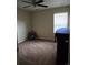 Bedroom with a window, carpet, and minimalistic design at 5131 Delphinium Cir, Brighton, CO 80601