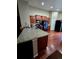 Kitchen featuring granite countertops and hardwood floors at 5131 Delphinium Cir, Brighton, CO 80601