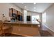 Open kitchen featuring granite countertops, stainless steel appliances, and wood cabinetry at 5131 Delphinium Cir, Brighton, CO 80601