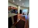 Bright kitchen with granite countertops and adjacent dining area at 5131 Delphinium Cir, Brighton, CO 80601
