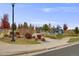 Beautiful park with playground equipment, a covered picnic area, and colorful fall foliage under a blue sky at 8019 Blackstone Pkwy, Aurora, CO 80016