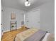 Bedroom features hardwood floors, neutral paint, large closet and lots of natural light at 755 S Milwaukee St, Denver, CO 80209