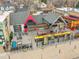 Aerial view of local coffee shop with a spacious outdoor seating area at 755 S Milwaukee St, Denver, CO 80209