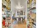 Elegant dining room with stylish decor, mirrored walls, hardwood floors, and a contemporary light fixture at 755 S Milwaukee St, Denver, CO 80209