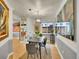 Well-lit dining room with modern decor, a sleek table, and stylish chairs, perfect for entertaining guests at 755 S Milwaukee St, Denver, CO 80209