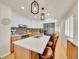 Modern kitchen featuring sleek countertops, stainless steel appliances, and stylish island, offers a culinary experience at 755 S Milwaukee St, Denver, CO 80209