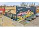 Bonnie Brae Liquor exterior featuring a colorful mural and parking at 755 S Milwaukee St, Denver, CO 80209