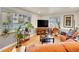 Bright living room with large windows, hardwood floors, comfortable seating, and stylish decor, a perfect space at 755 S Milwaukee St, Denver, CO 80209