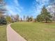Open park space featuring a curved pathway and expansive grassy area at 755 S Milwaukee St, Denver, CO 80209