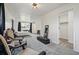 Spacious bedroom with carpet flooring, natural light, neutral tones, and closet access at 11715 W 30Th Pl, Lakewood, CO 80215