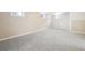 Large finished basement featuring neutral carpet and a light wall color at 1462 Eudora St, Denver, CO 80220