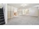 Spacious finished basement with fresh carpet and painted wainscoting at 1462 Eudora St, Denver, CO 80220