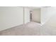 Bright, empty room offering flexible usage; new carpet and neutral paint at 1462 Eudora St, Denver, CO 80220