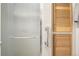 Shower with glass door and adjacent storage at 1462 Eudora St, Denver, CO 80220