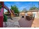Backyard features a stone patio with a fire pit and plenty of room for outdoor seating at 1438 N Franklin St # 100, Denver, CO 80218
