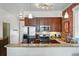 Well-equipped kitchen with stainless steel appliances and beautiful granite countertops at 1438 N Franklin St # 100, Denver, CO 80218