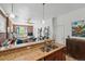 Open-concept kitchen features granite countertops and stainless-steel sink at 1438 N Franklin St # 100, Denver, CO 80218