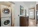 Convenient laundry room with stackable washer and dryer at 1438 N Franklin St # 100, Denver, CO 80218