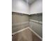 Walk-in closet with white walls and carpeted floors at 16841 Askins Loop # 208, Parker, CO 80134